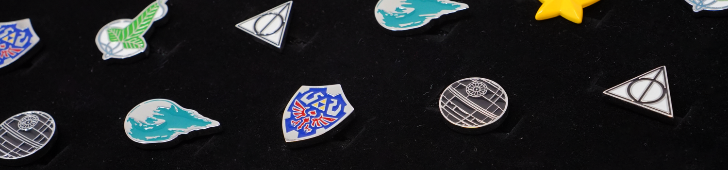 A variety of cufflinks on a black background