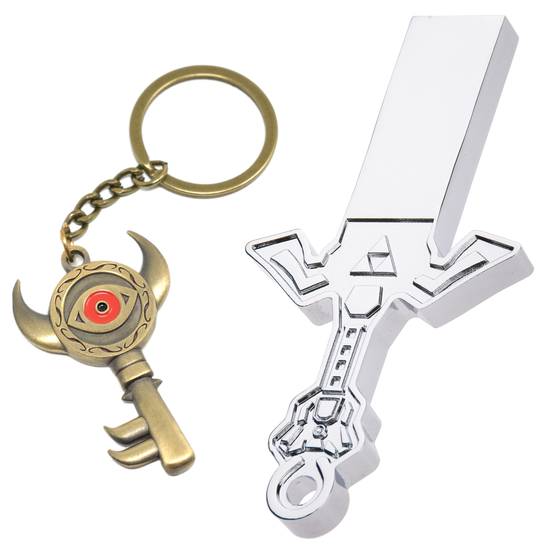 A silver USB Drive next to a gold and red keychain, both featuring designs inspired by the Legend of Zelda series