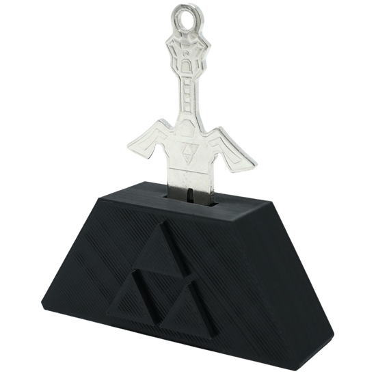 A silver key atop a black pedestal featuring a triangle Triforce design from the Legend of Zelda