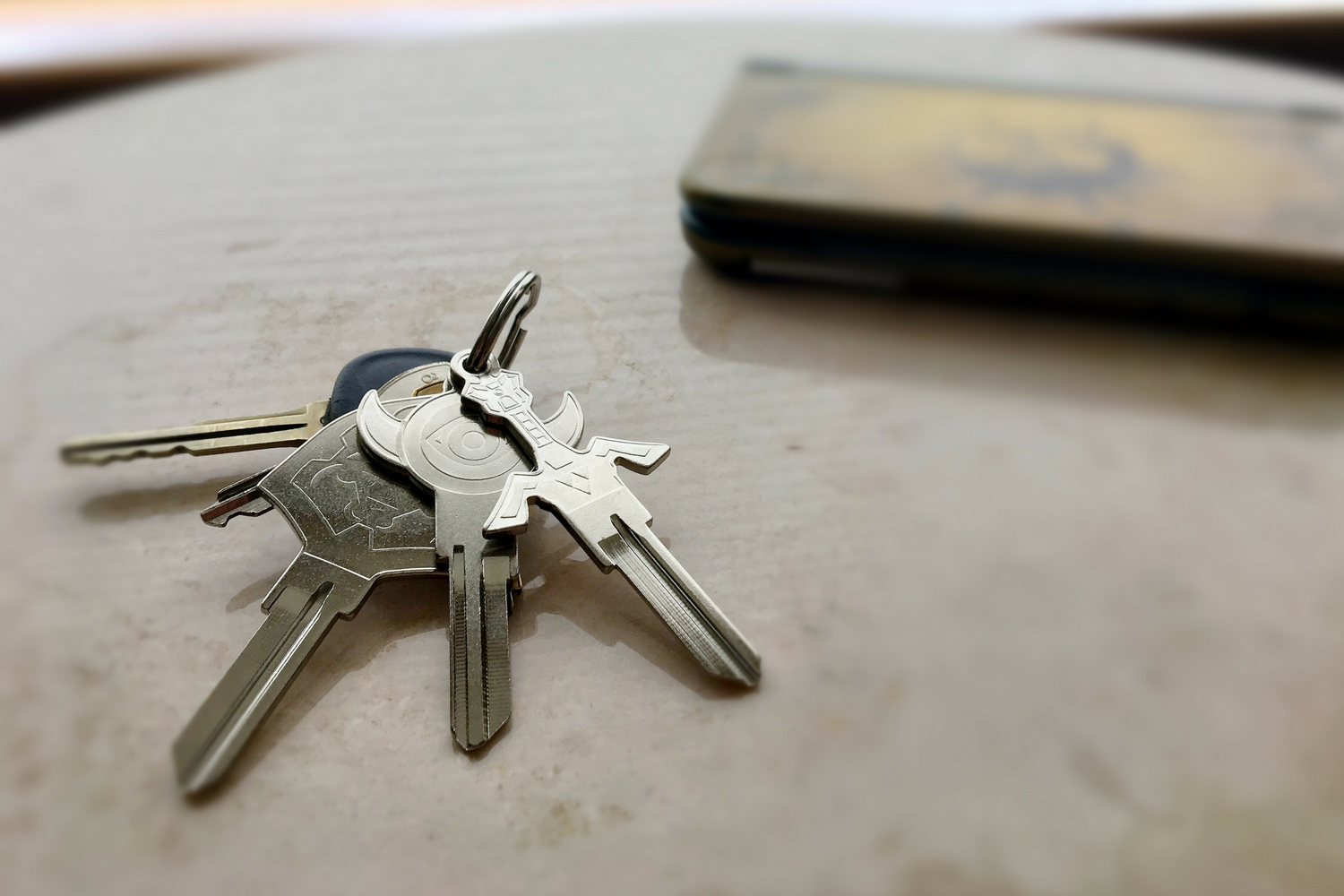 A variety of silver keys on a table